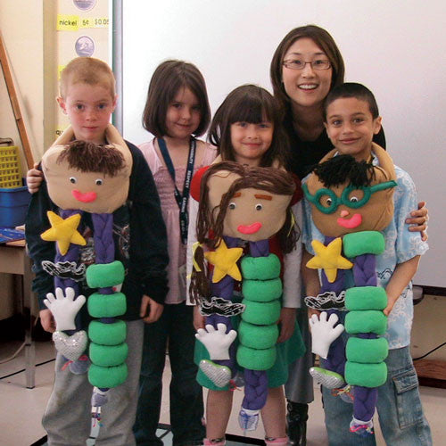 Braidys with Children and Teacher